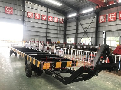 1672641190113800.jpg 10噸骨架式雙牽引平板拖車I.jpg