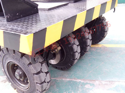 1677135367530319.jpg 10噸車間工件鐵皮卷圓桶運(yùn)輸平板拖車5I.jpg